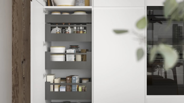Space tower storage unit in a Camden White Kitchen