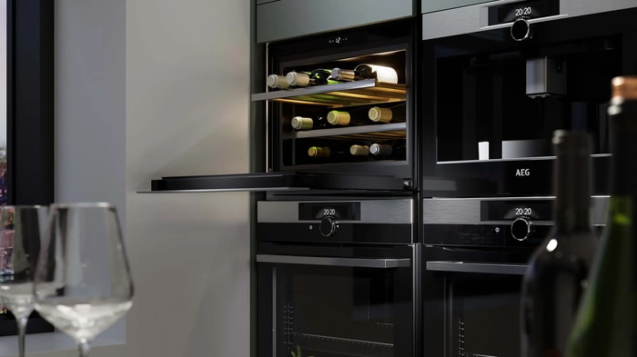 An open wine rack in an Intelliga Chester Cloudy Blue Kitchen