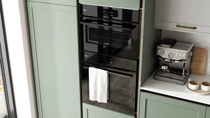 Integrated appliances in an Intelliga Chester Reed Green Kitchen