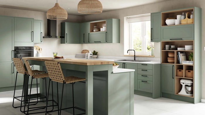 Chester Reed Green Kitchen with the sink and tap underneath the window