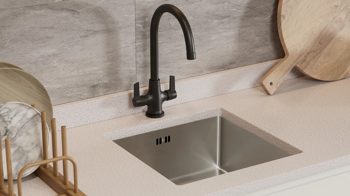Sink and tap in a Madison Gloss Stone Kitchen