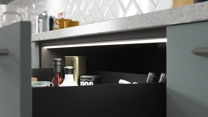 An open drawer in a Sandford Cloudy Blue Kitchen