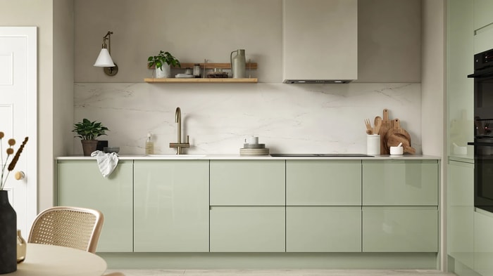 Sofia Reed Green Kitchen with an induction hob