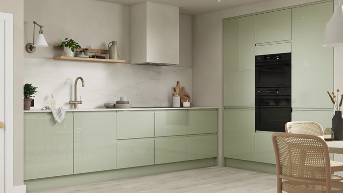 Sofia Reed Green Kitchen with integrated ovens